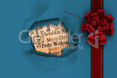 Composite image of red christmas bow and ribbon