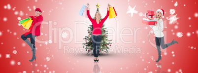 Composite image of happy blonde holding shopping bags