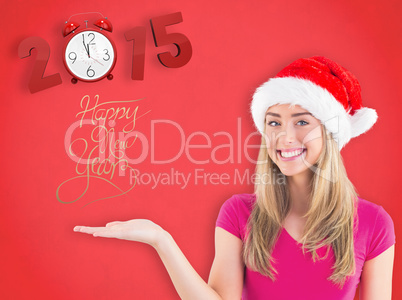 Composite image of festive blonde presenting with hand