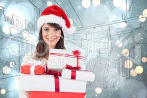 Composite image of attractive woman wearing santa hat with gifts