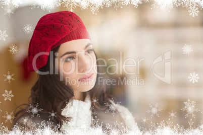 Composite image of portrait of a pretty brunette in day dreaming