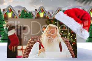 Composite image of relaxed santa writing list with a quill