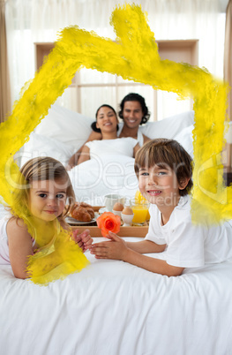 Composite image of siblings having breakfast with their parents