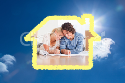 Composite image of happy couple organizing their new home