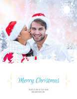 Composite image of festive young couple holding gift