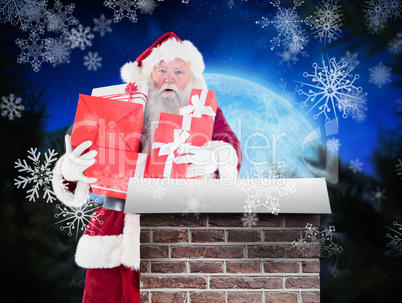 Composite image of santa carries a few presents