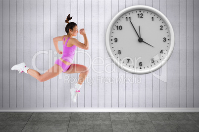 Composite image of fit brunette running Composite image of fit brunette running