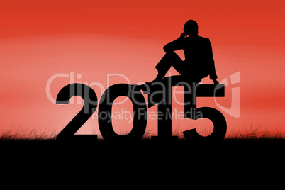 Composite image of silhouette of woman sitting