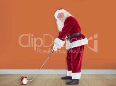 Composite image of santa claus is playing golf