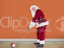 Composite image of santa claus is playing golf