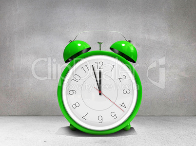 Composite image of alarm clock counting down to twelve