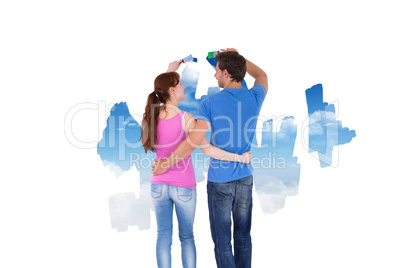 Composite image of couple both about to paint