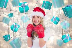 Composite image of festive blonde punching with boxing gloves