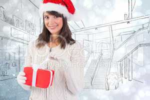Composite image of smiling young woman in santa hat opening a gi