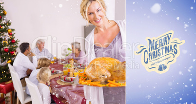 Composite image of proud mother showing roast turkey