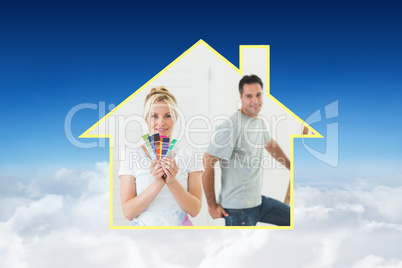 Composite image of couple with color swatches and ladder in a ne
