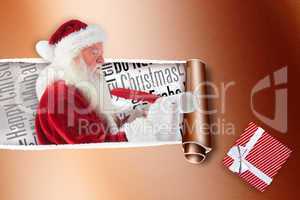 Composite image of father christmas writes a list