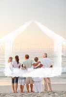 Composite image of beautiful family at the beach