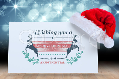 Composite image of colourful banner wishing a happy christmas