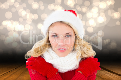 Composite image of happy festive blonde