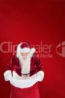 Composite image of santa looks in his bag