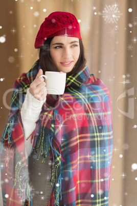 Composite image of brunette with cover holding mug and thinking