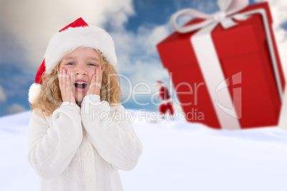 Composite image of festive little girl with hands on face