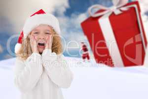 Composite image of festive little girl with hands on face