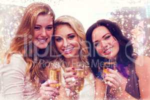 Composite image of pretty friends drinking champagne together