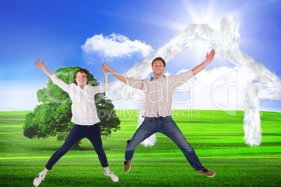 Composite image of couple jumping and holding hands