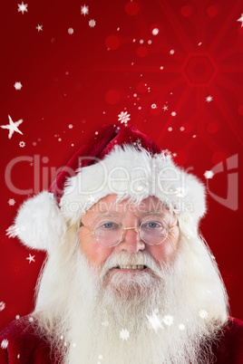 Composite image of santa smiles in the camera