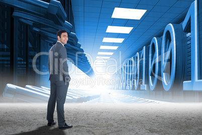 Composite image of smiling businessman standing