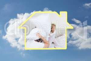 Composite image of girl hitting her father with pillow