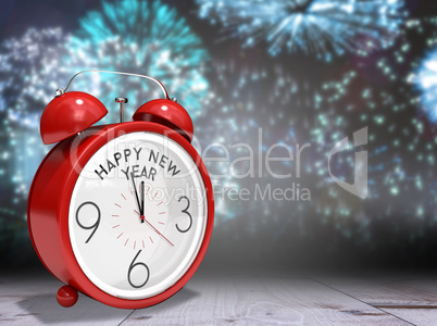 Composite image of happy new year in red alarm clock