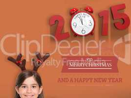 Composite image of festive little girl showing card