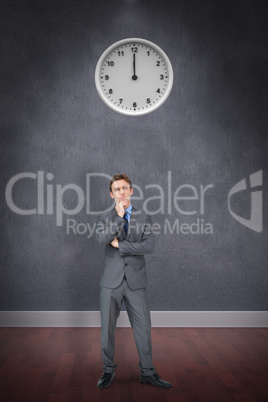 Composite image of thinking businessman