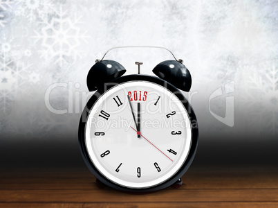 Composite image of 2015 in black alarm clock