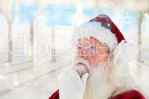 Composite image of santa is thinking about something