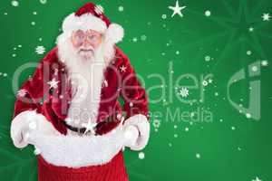 Composite image of santa open his red bag