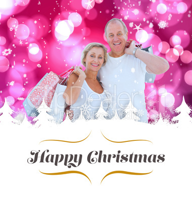 Composite image of couple with shopping bags Composite image of couple with shopping bags