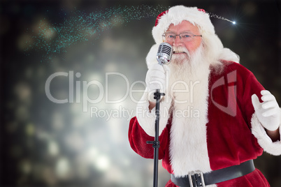 Composite image of santa claus is singing christmas songs