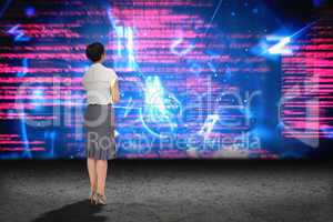 Composite image of businesswoman standing