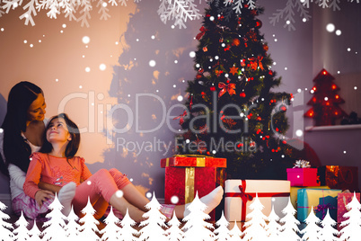 Composite image of mother and daughter waiting for santa claus