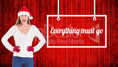 Composite image of festive blonde shouting at camera