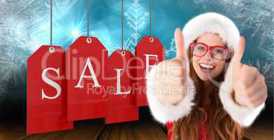 Composite image of festive redhead smiling at camera