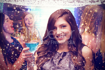 Composite image of brunette with cocktail