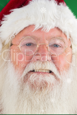 Composite image of santa smiles in the camera