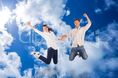 Composite image of couple jumping and holding hands