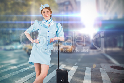 Composite image of pretty air hostess smiling at camera