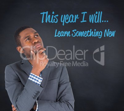 Composite image of young businessman thinking